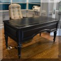 F20. Sligh Furniture leather top desk. 30"h x 61"w x 30"d 